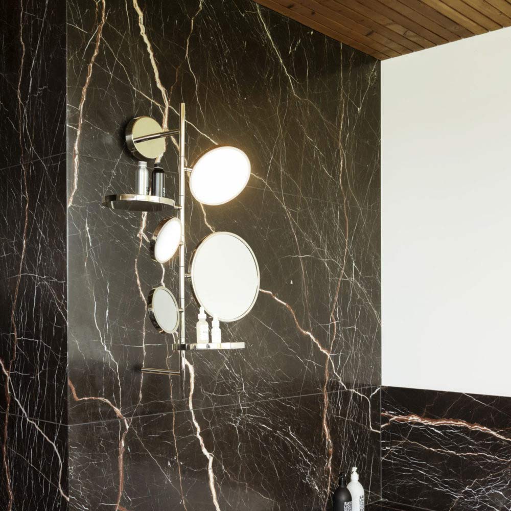 Tell Me Stories LED Wall Light in bathroom.