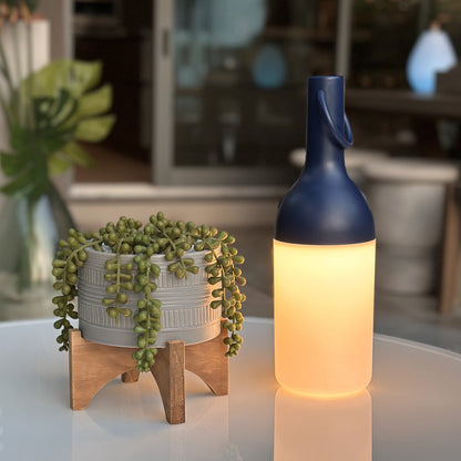 ELO Nomad Portable Outdoor LED Table Lamp in Outdoor area.