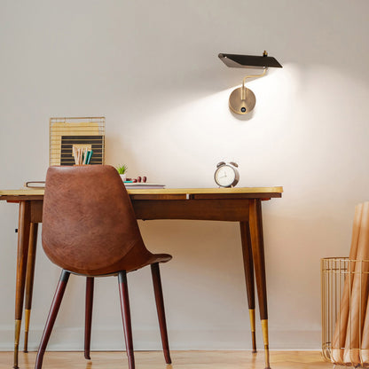 Loyd LED Swing Arm Wall Light in living room.