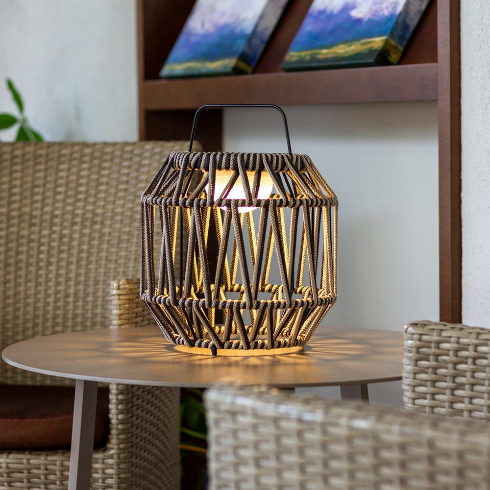 Bauma Outdoor LED Rechargeable Table Lamp in living room.