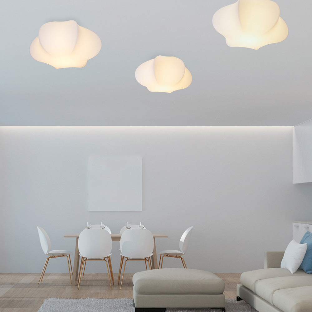 Swell Flush Mount Ceiling Light in living room.