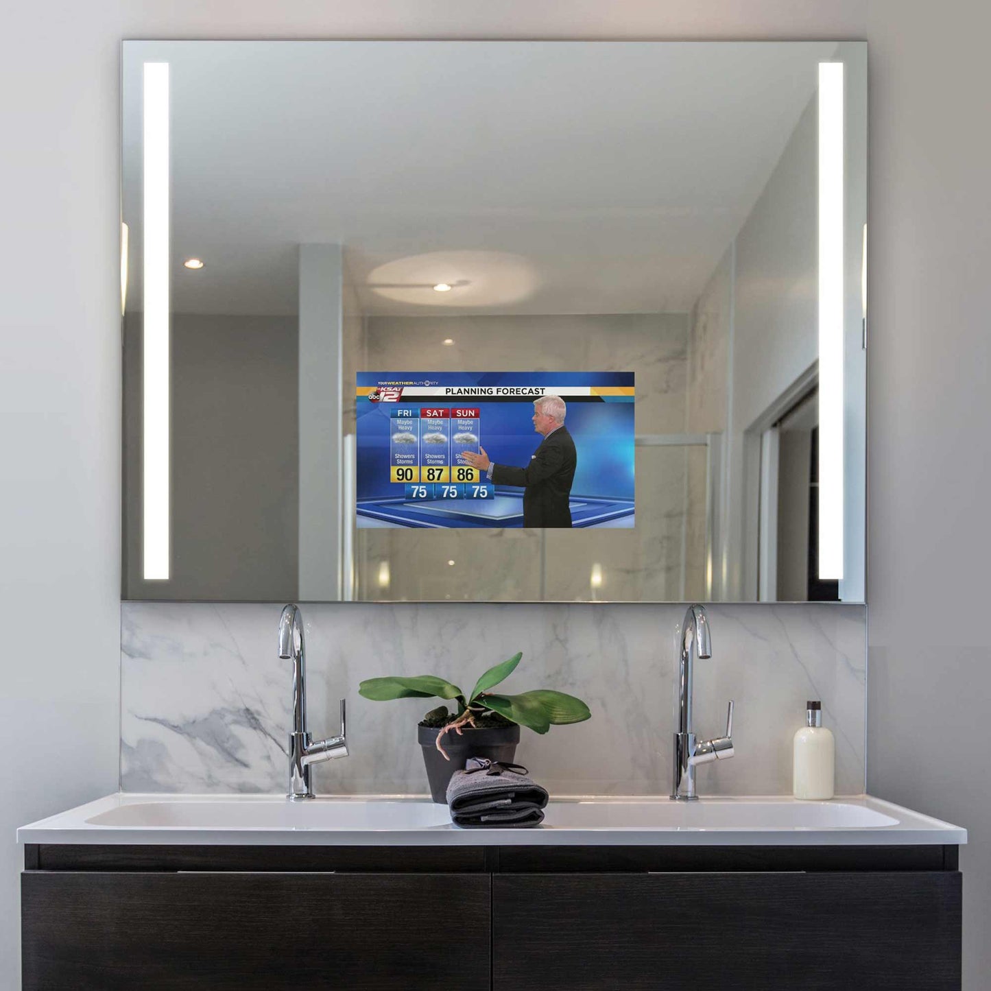 Integrity LED Lighted Mirror TV in bathroom.
