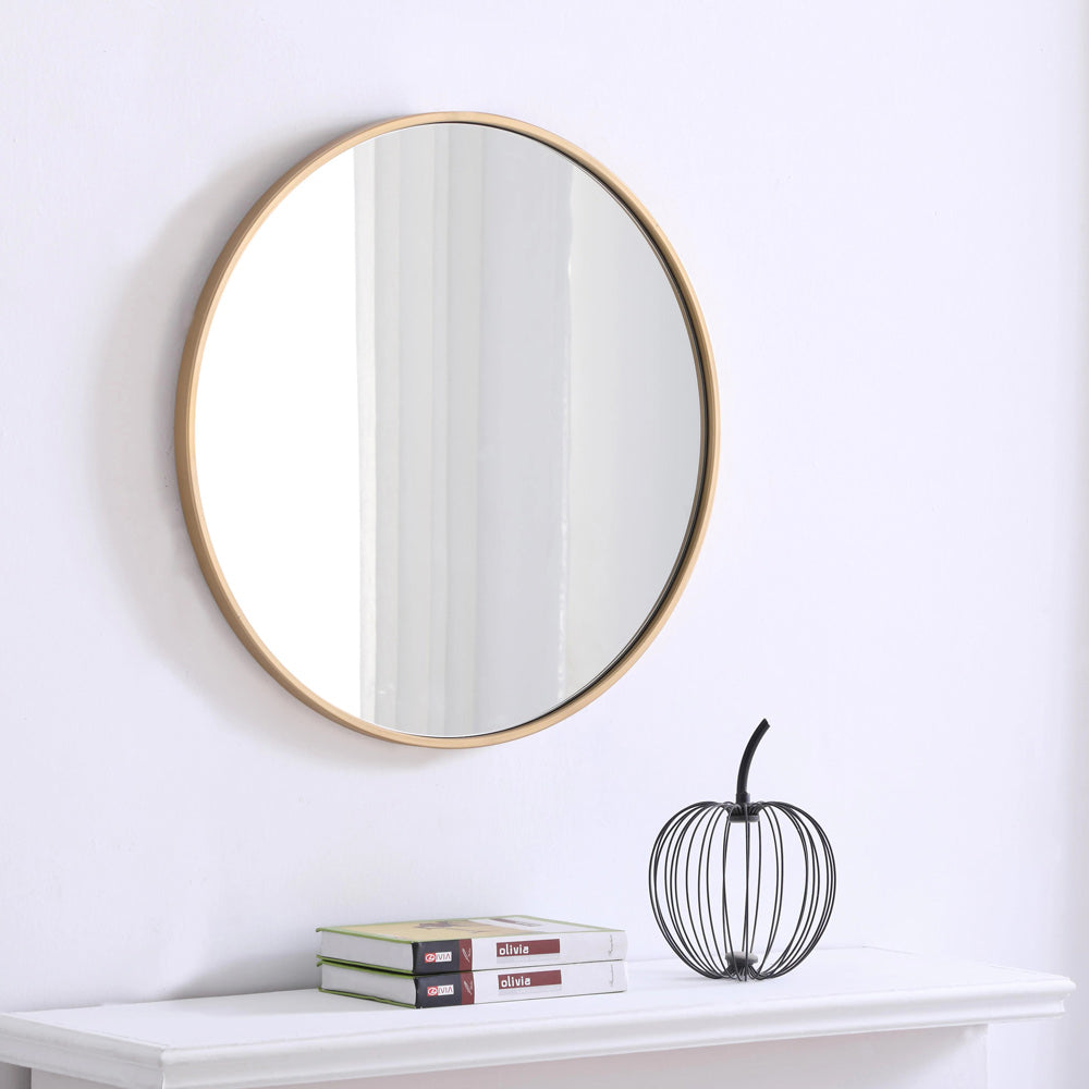 Elegant Round Framed Mirror in living room.