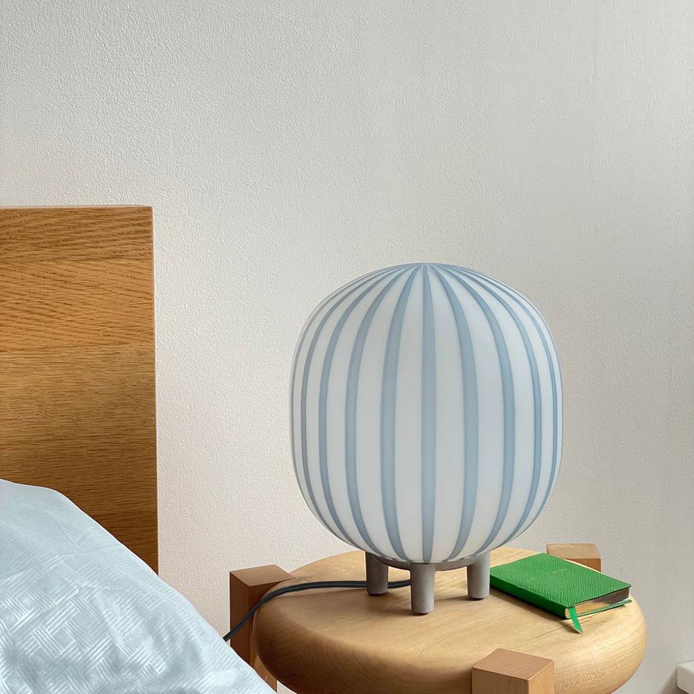 Filigrana Cylinder LED Table Lamp in bedroom.