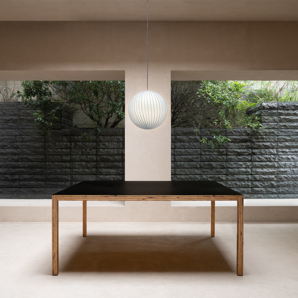 Filigrana Globe Pendant Light in living room.