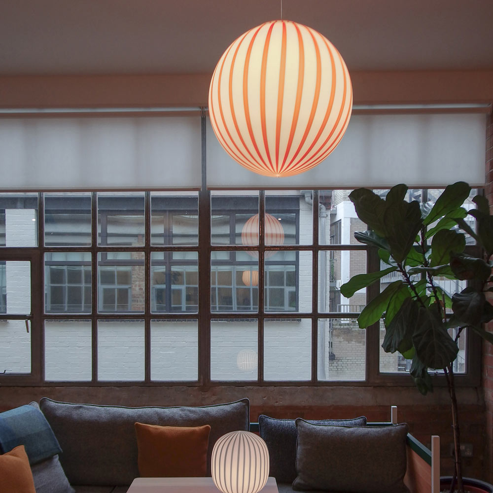 Filigrana Globe Pendant Light in living room.