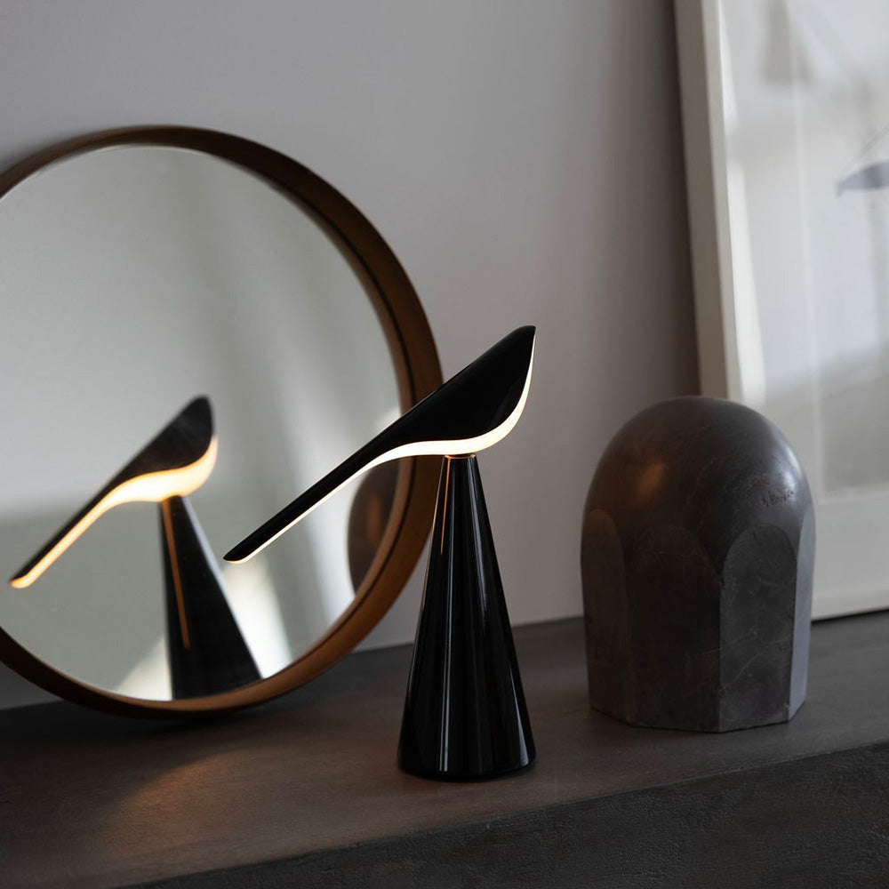 Tiki LED Rechargeable Table Lamp in living room.