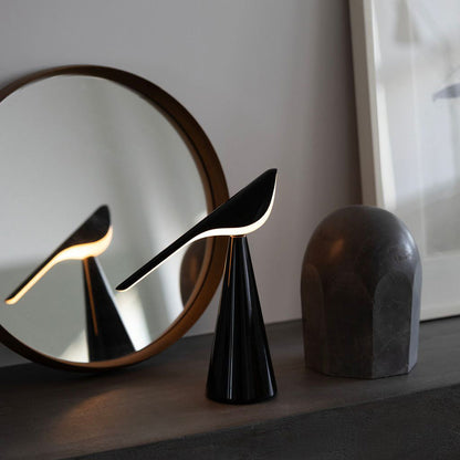 Tiki LED Rechargeable Table Lamp in living room.