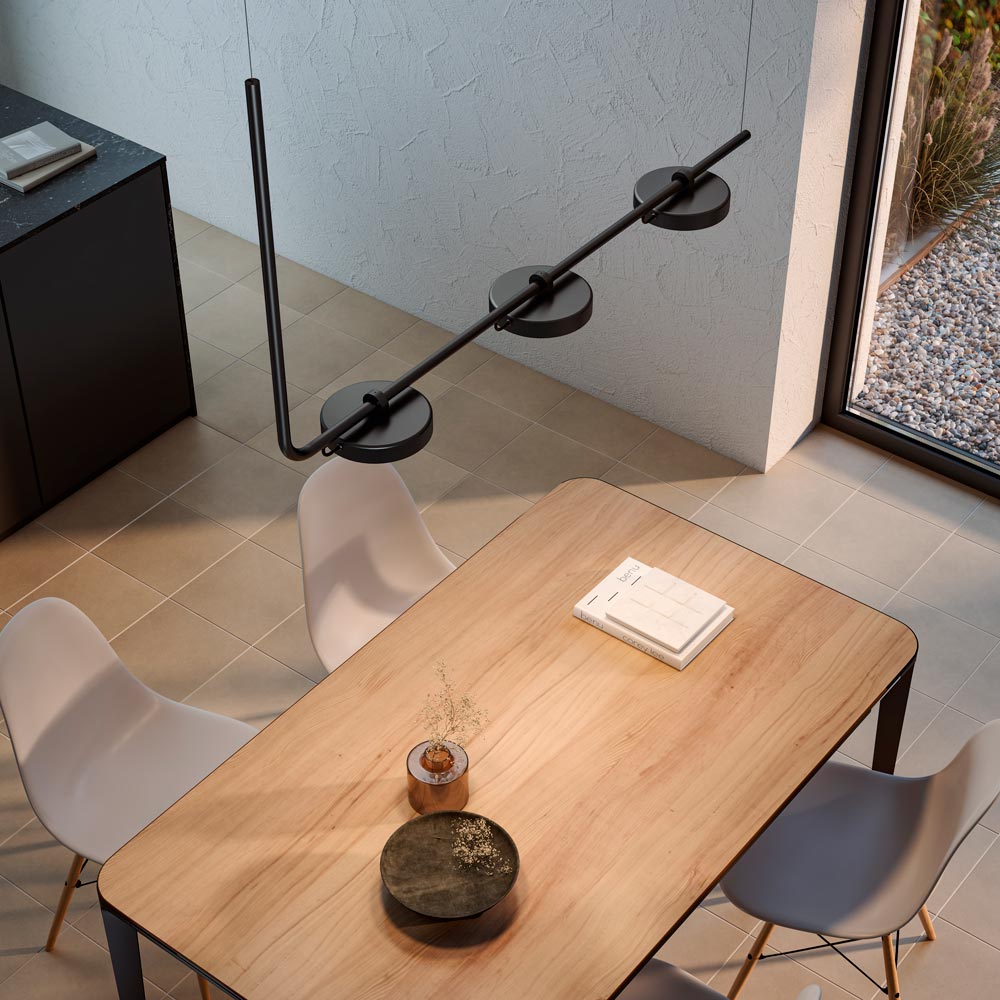 Aro Linear LED Pendant Light in living room.