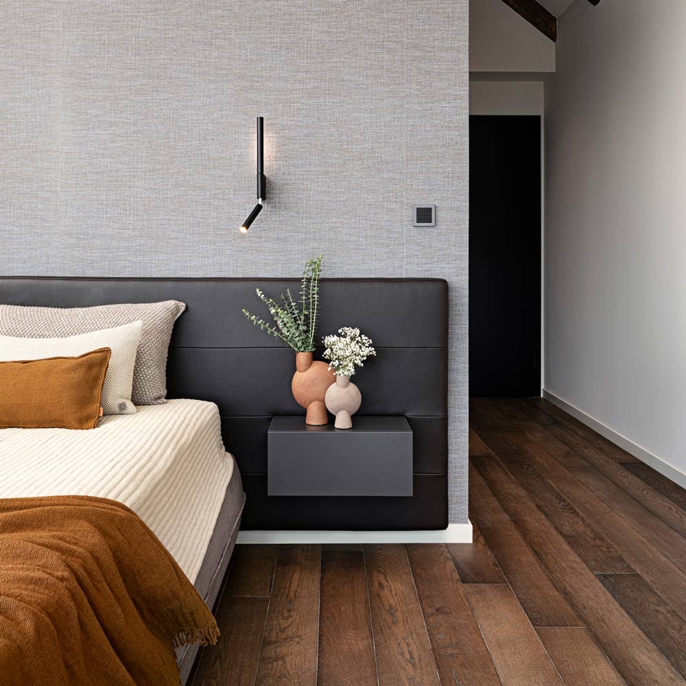 Canut LED Wall Light in bedroom.