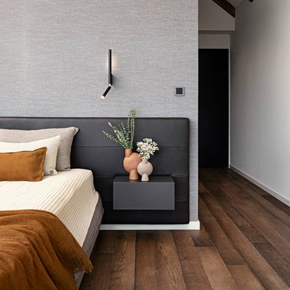 Canut LED Wall Light in bedroom.