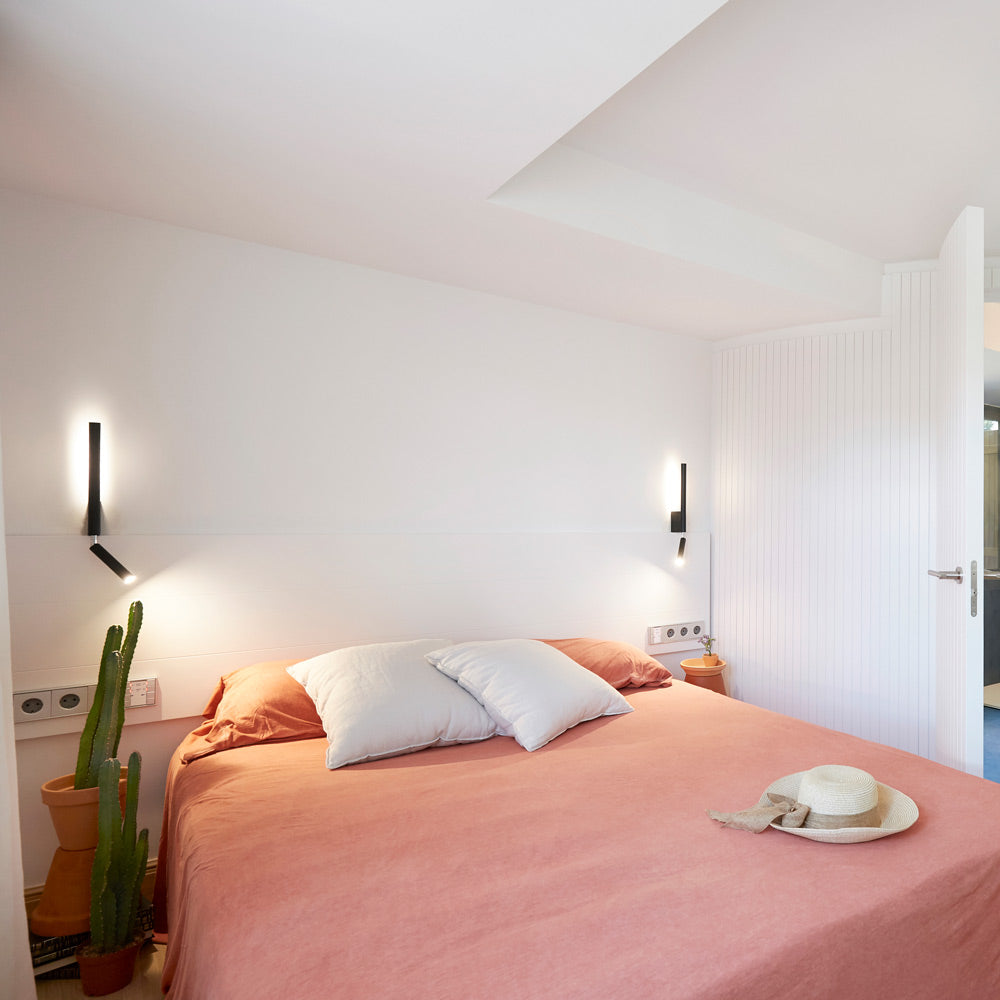 Canut LED Wall Light in bedroom.