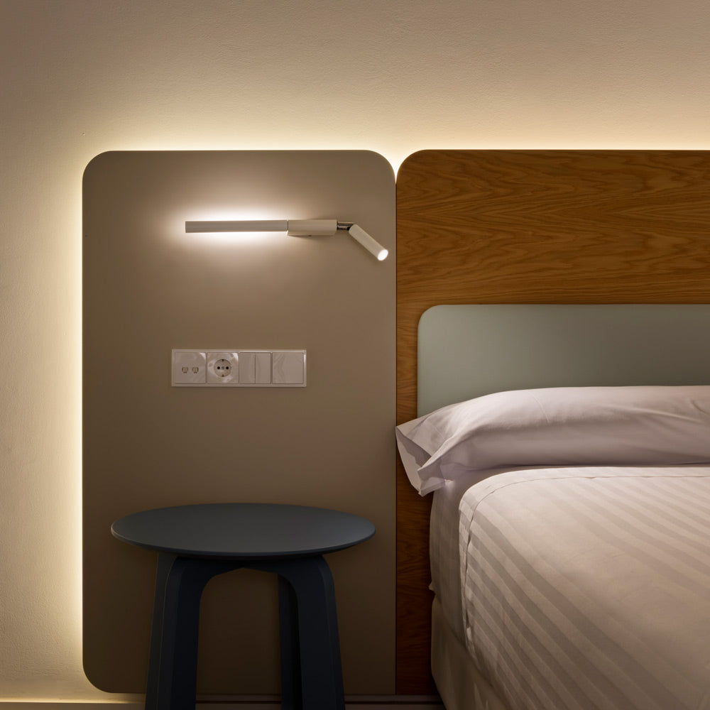 Canut LED Wall Light in bedroom.
