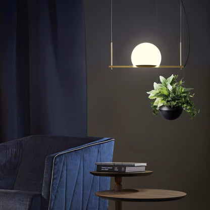 Circ Linear LED Pendant Light in living room.