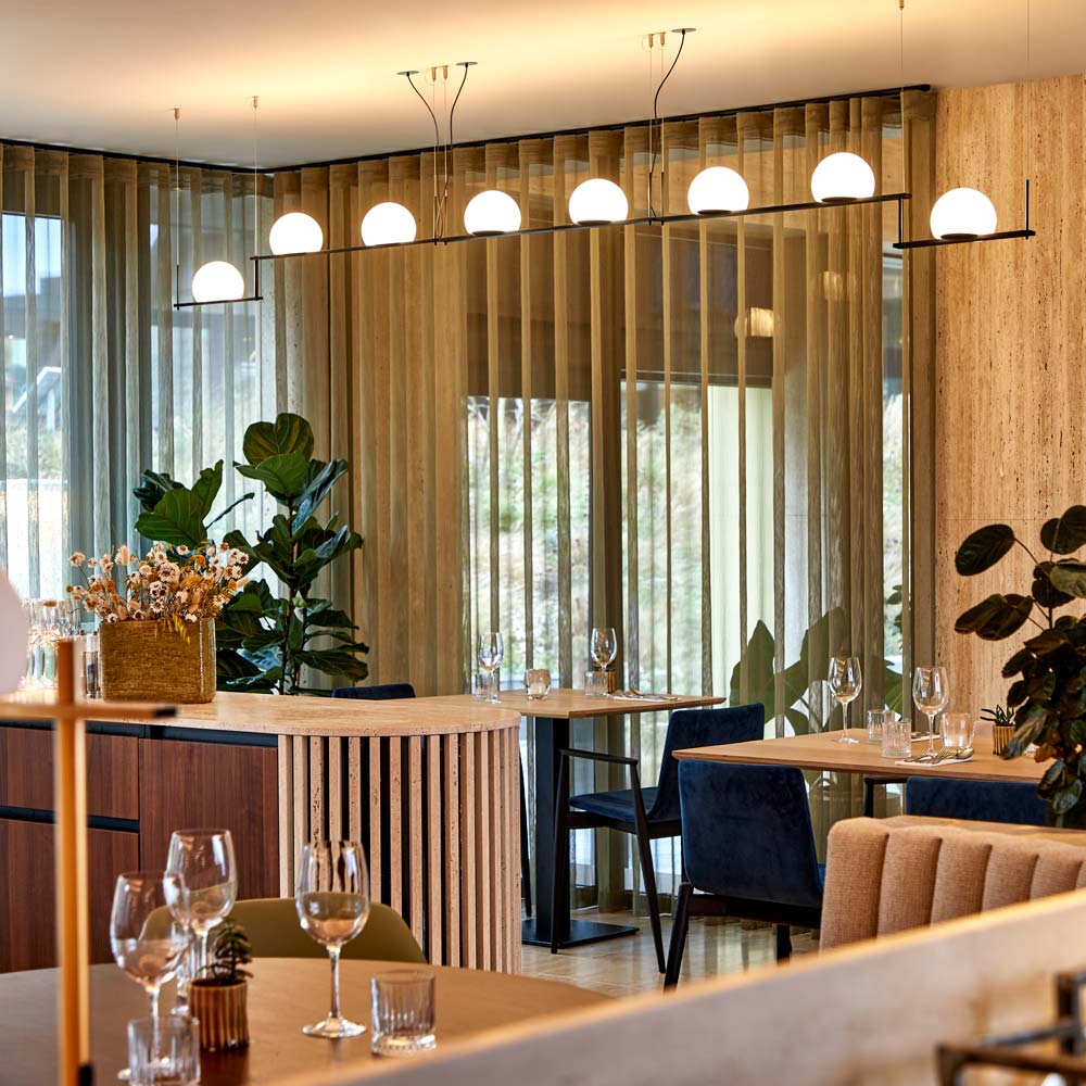 Circ Linear LED Pendant Light in restaurant.