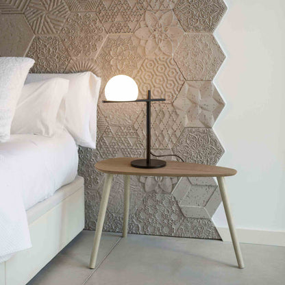 Circ Table Lamp in bedroom.