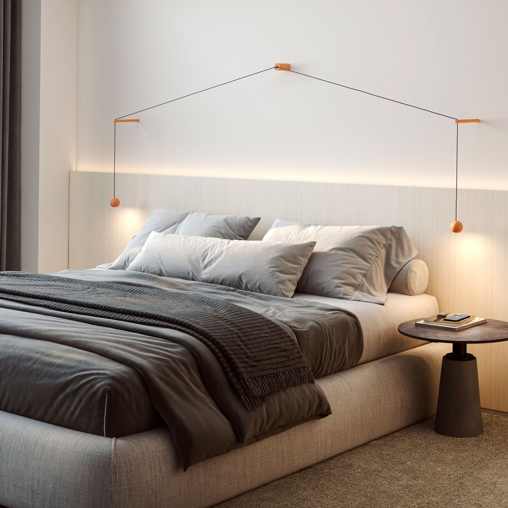 Compass Wall Light in bedroom.