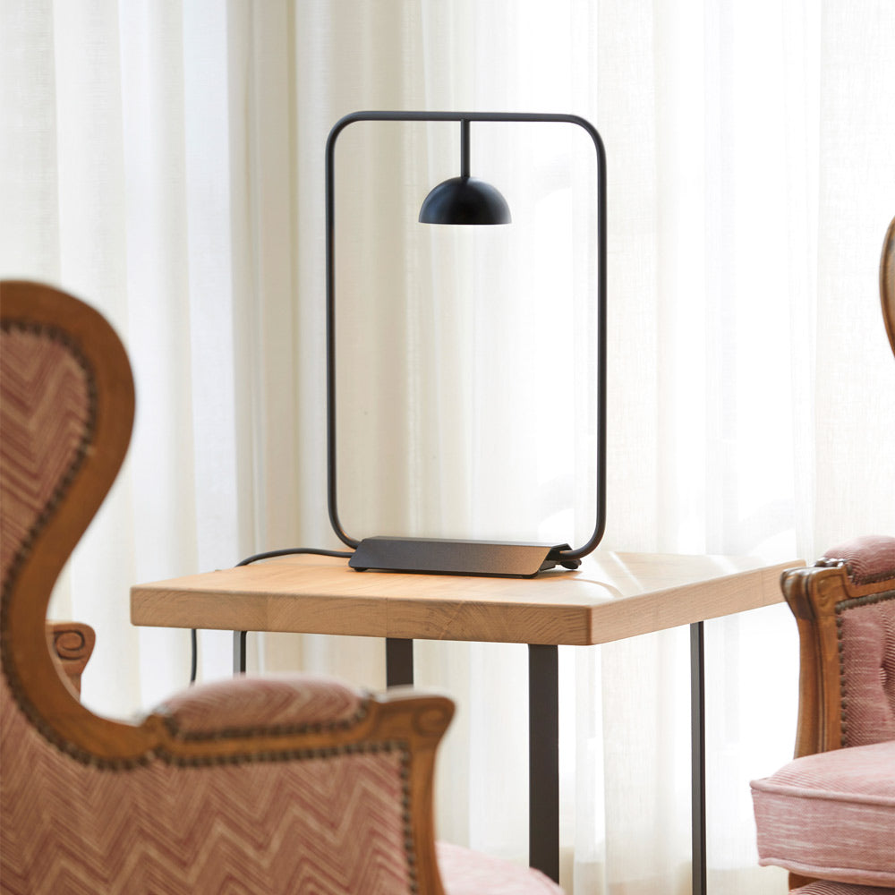 Cupolina LED Table Lamp in living room.