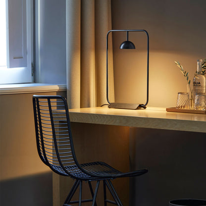 Cupolina LED Table Lamp in reading room.