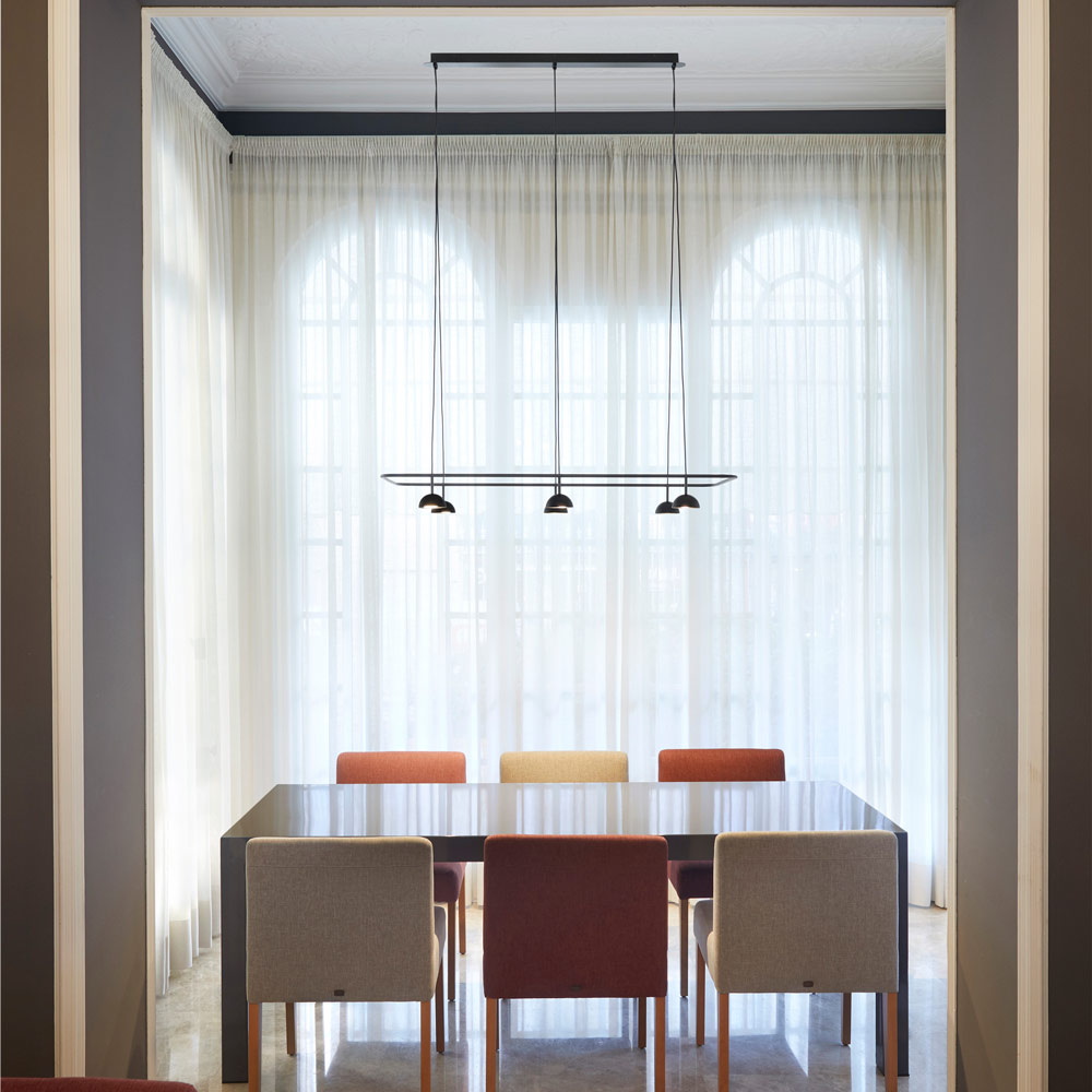 Cupolina Linear LED Pendant Light in dining room.