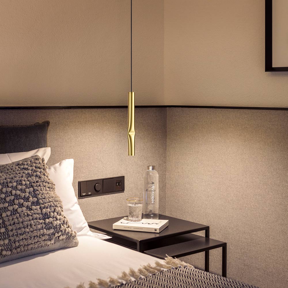 Flow LED Pendant Light in bedroom.