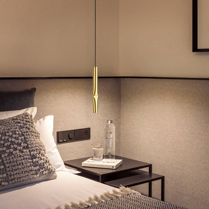 Flow LED Pendant Light in bedroom.
