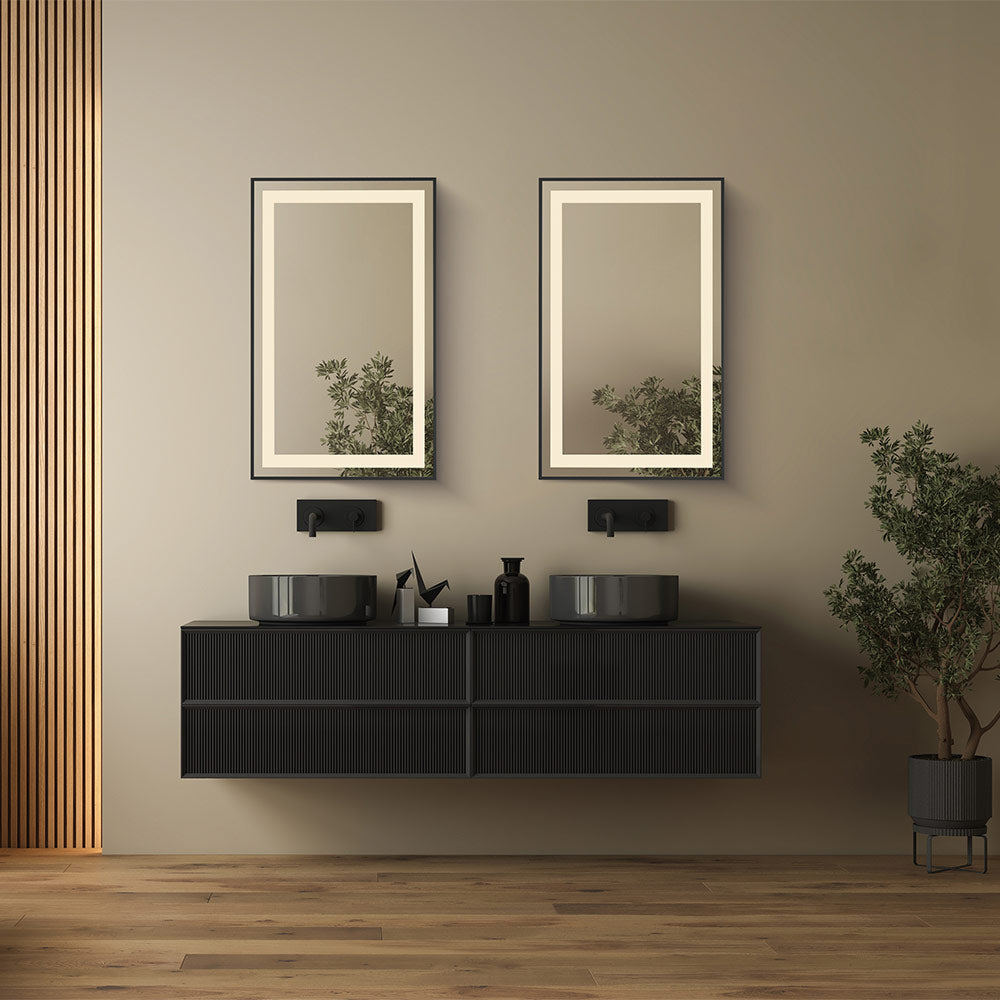 Framed LED Wall Mirror in bathroom.