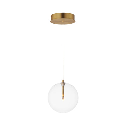 Global Pendant Light in Natural Aged Brass.