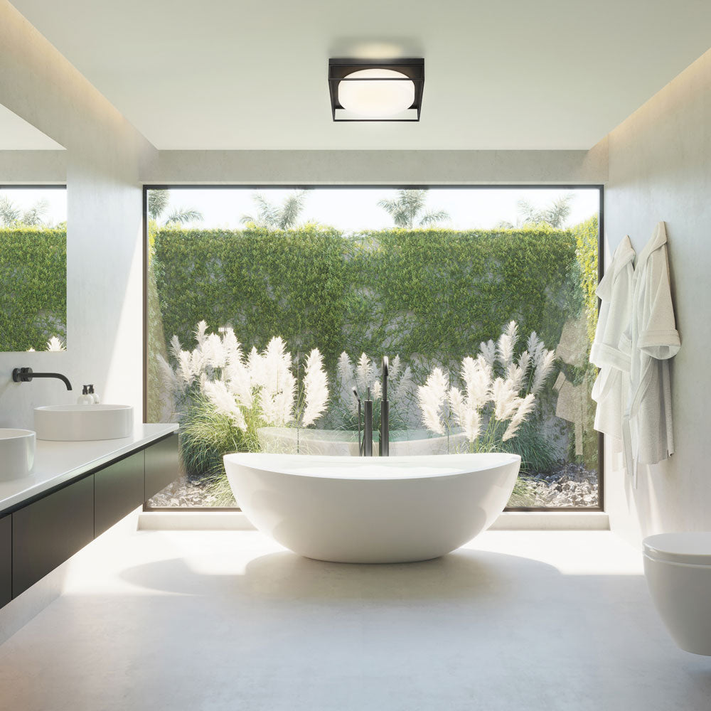 Rover LED Flush Mount Ceiling Light in bathroom.