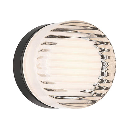 Sternn Round Outdoor LED Wall Light in Clear Ribbed Glass.