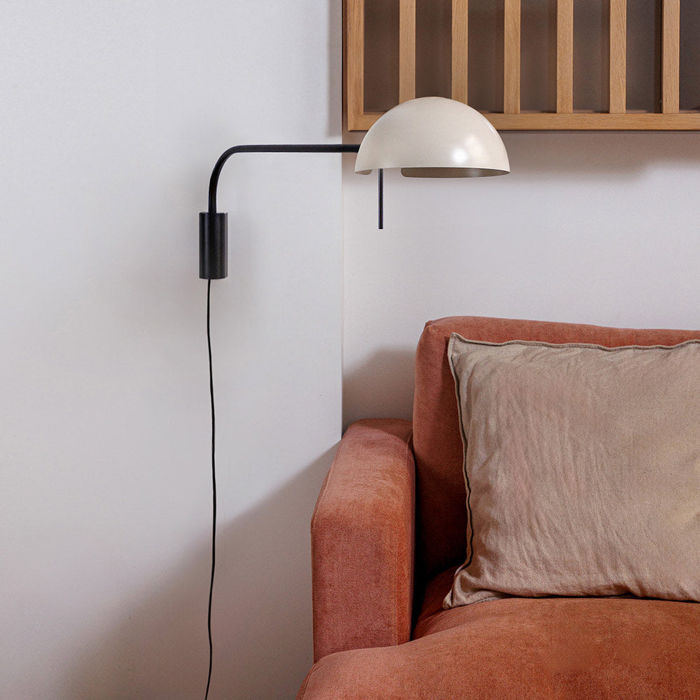 Dominica Arm Wall Light in living room.