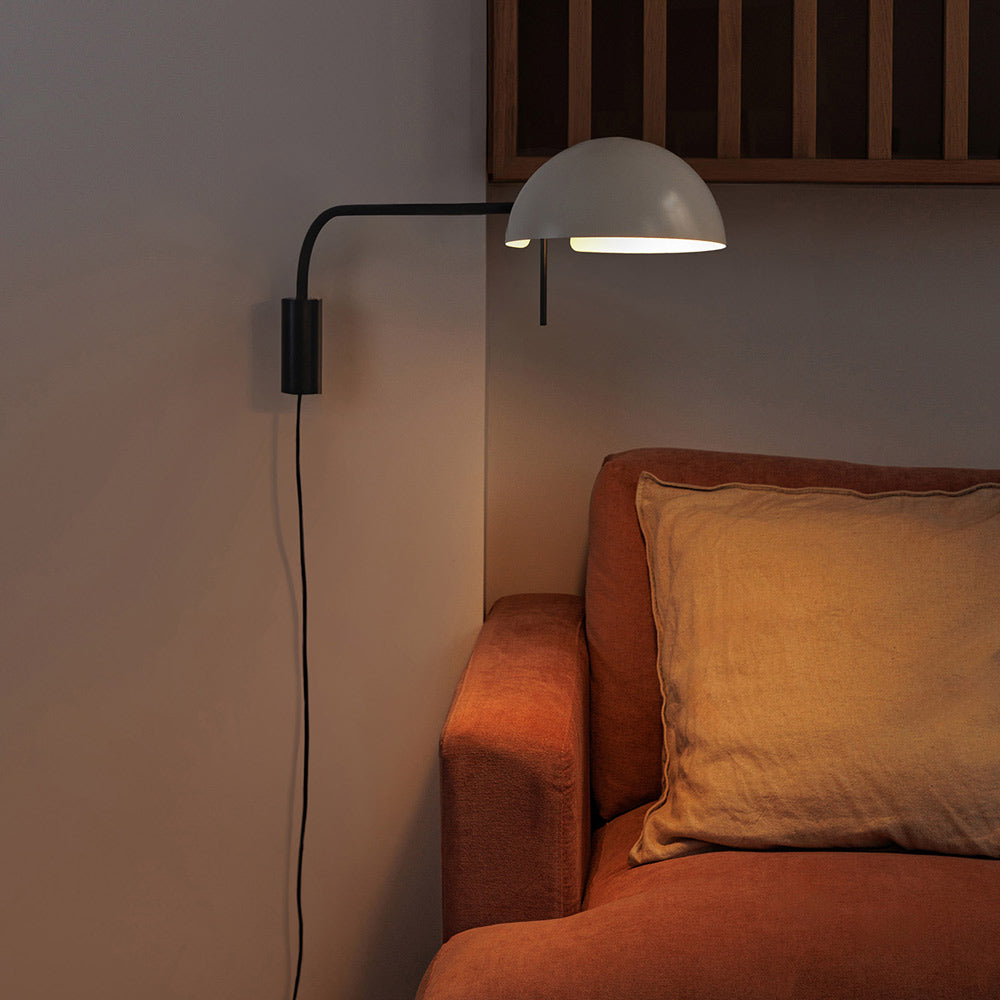 Dominica Arm Wall Light in living room.
