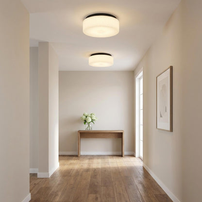 Axira Flush Mount Ceiling Light in living room.