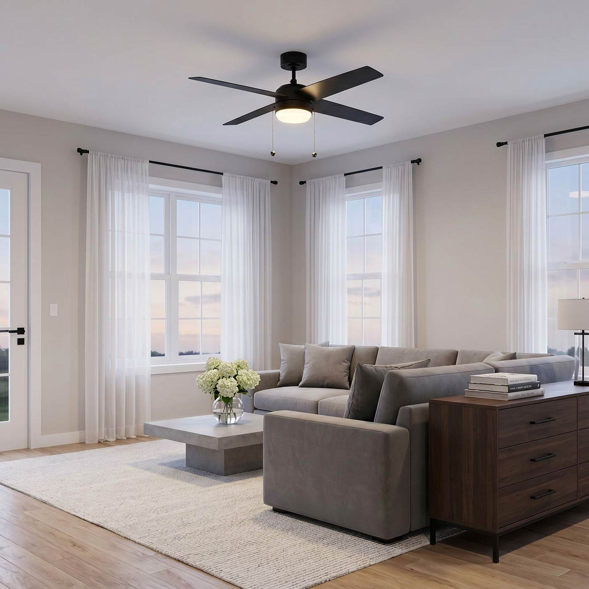 Loni LED Pull Chain Ceiling Fan in living room.