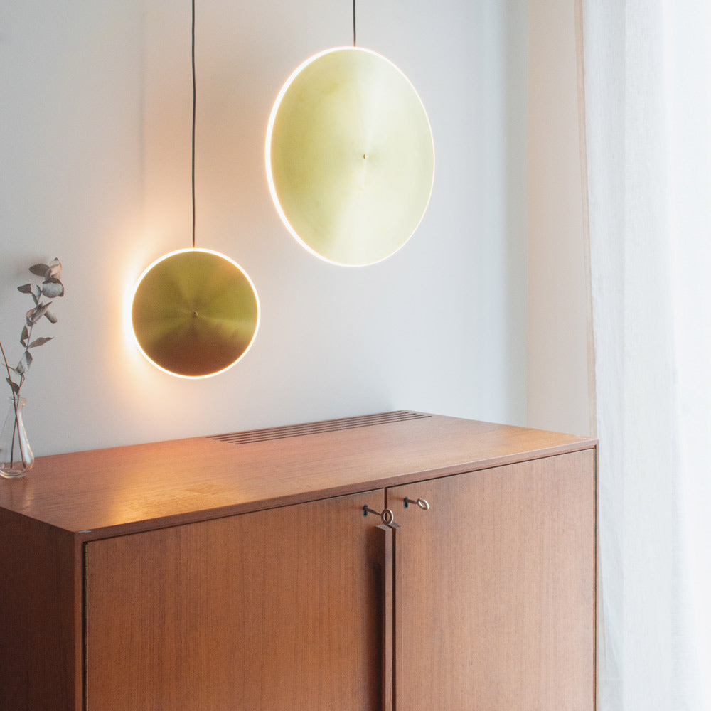 Chrona LED Vertical Pendant Light in living room.