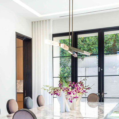 Axis LED Linear Pendant Light in dining room.