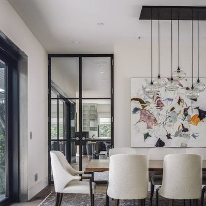 Coppa Linear Pendant Light in dining room.