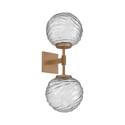 Gaia Double LED Wall Light in Novel Brass/Clear Blown Glass.