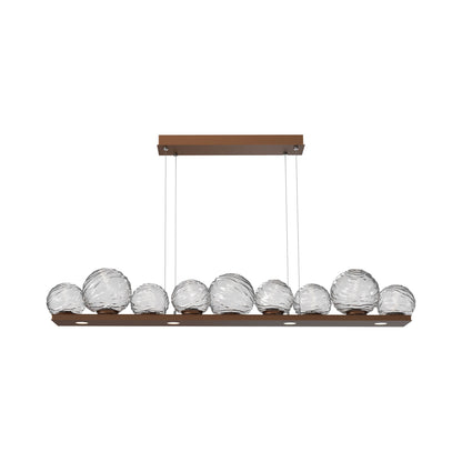 Gaia Linear LED Chandelier in Burnished Bronze/Clear Blown Glass (59-Inch).