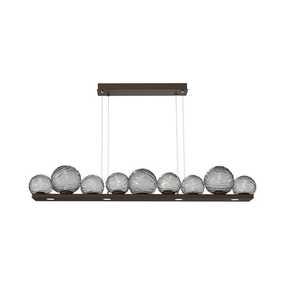 Gaia Linear LED Chandelier in Flat Bronze/Smoke Blown Glass (59-Inch).