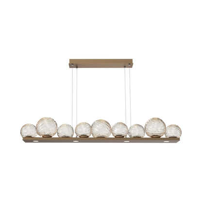 Gaia Linear LED Chandelier in Novel Brass/Amber Blown Glass (59-Inch).