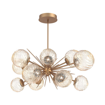 Gaia Oval Starburst LED Chandelier in Novel Brass/Amber Blown Glass.