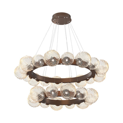 Gaia Two-Tier Radial Ring LED Chandelier in Burnished Bronze/Amber Blown Glass.