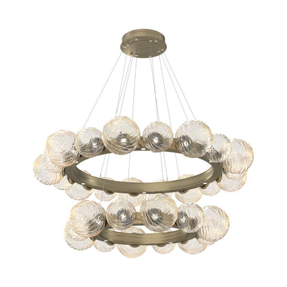 Gaia Two-Tier Radial Ring LED Chandelier in Heritage Brass/Amber Blown Glass.