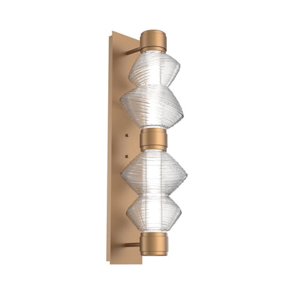 Mesa Mandrel Double LED Wall Light in Novel Brass/Clear Blown Glass.