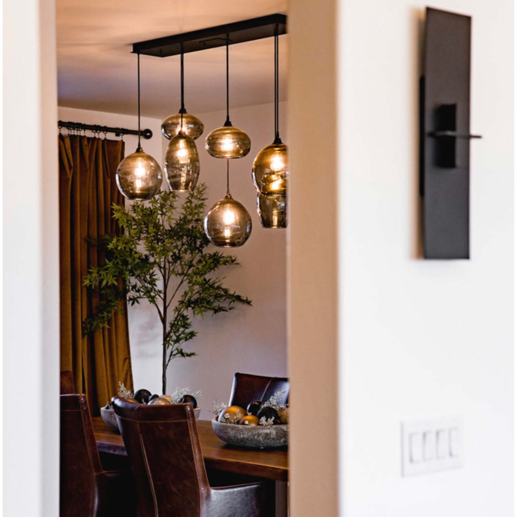 Misto Linear Pendant Light in dining room.