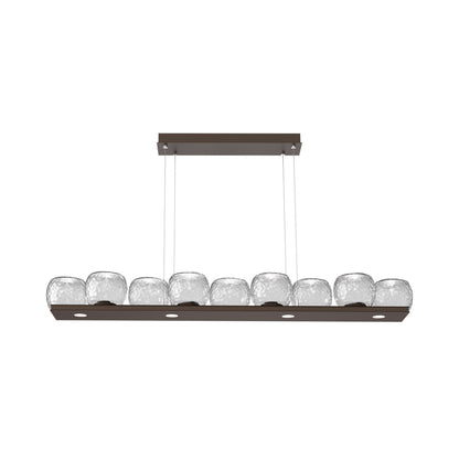 Vessel Linear LED Chandelier in Flat Bronze/Clear Blown Glass.