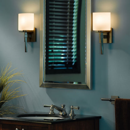 Beacon Hall Ellipse Glass Wall Light in bathroom.