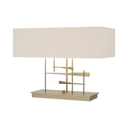 Cavaletti Table Lamp in Soft Gold/Flax.