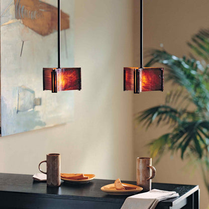 Exos Delta Pendant Light in dining room.